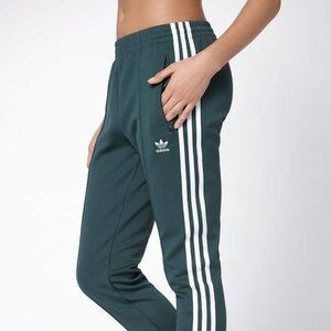 Adidas SST Track Pants In Collegiate Green